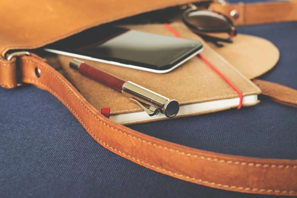 Calendar with a pen scheduling follow-up emails